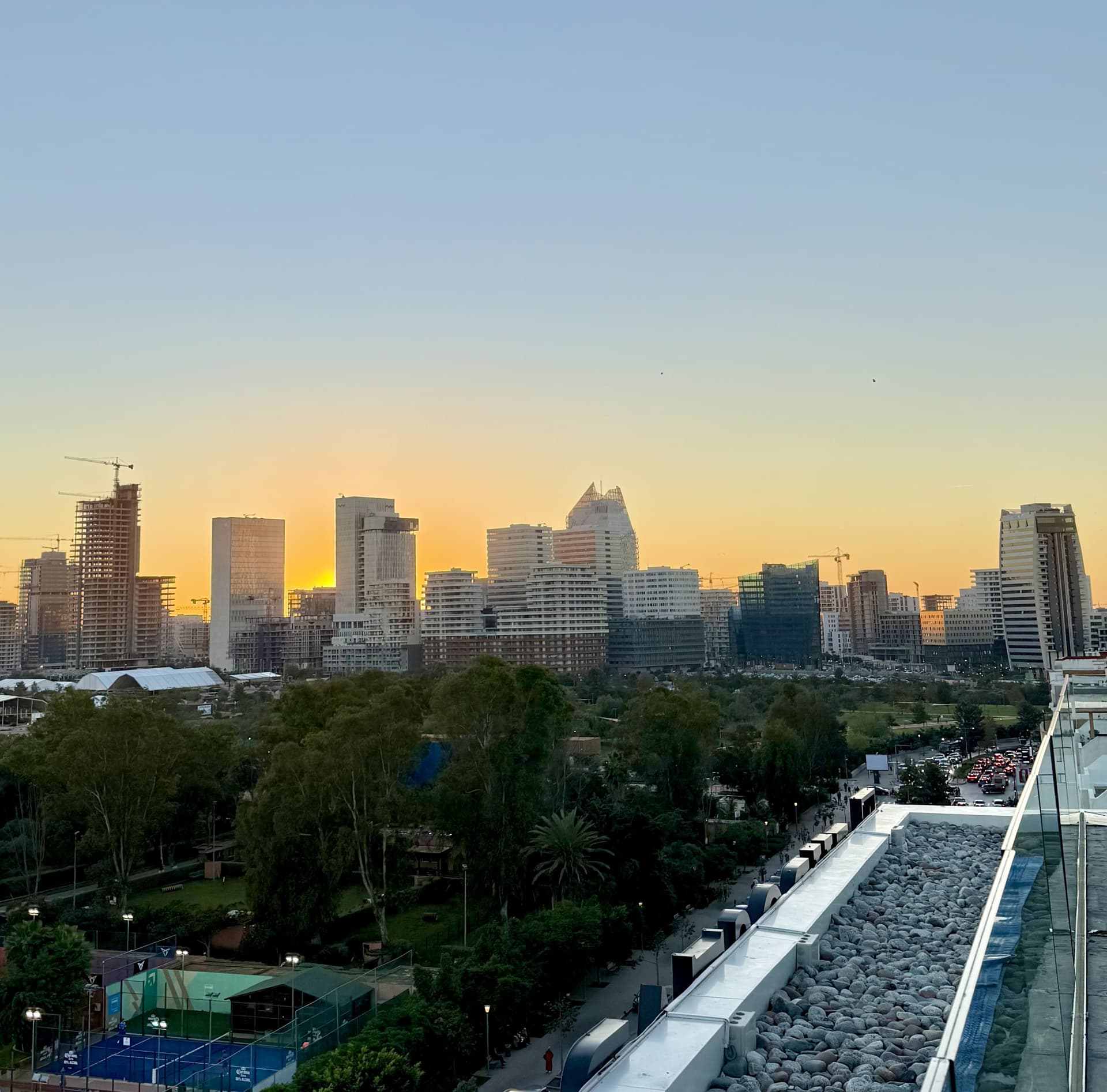 Casa Finance City skyline at sunset
